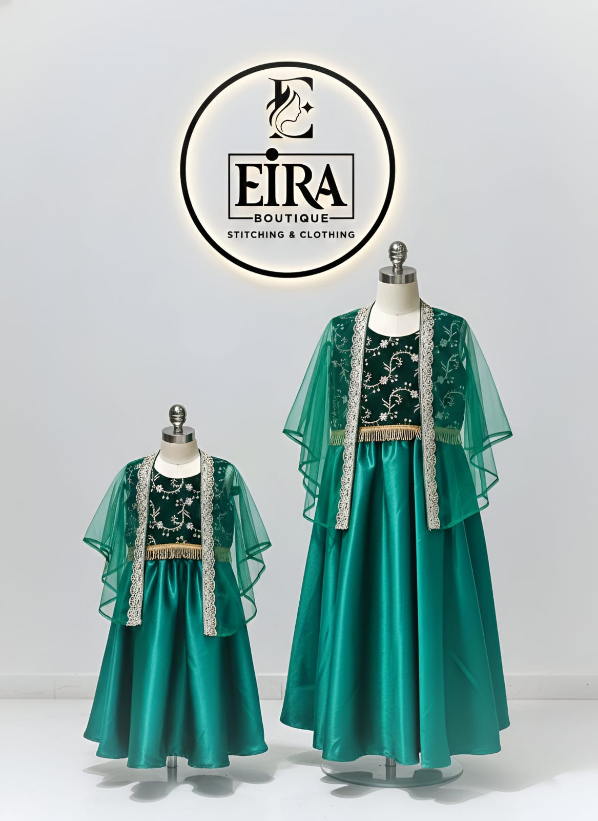 Emerald green satin and velvet party gown
